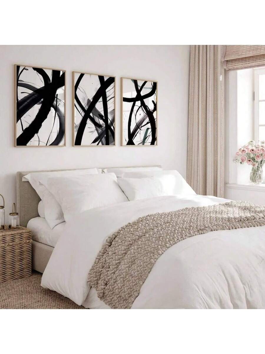 Transform your space with this striking 3-piece black and white abstract wall art collection. Featuring modern graphic designs printed on high-quality non-woven fabric, these versatile prints work beautifully in dining rooms, home offices, or any contemporary setting. The waterproof material ensures durability and easy maintenance, while the minimalist aesthetic complements any décor style. Available in both framed and unframed options to suit your preference. Create an instant focal point that adds sophist