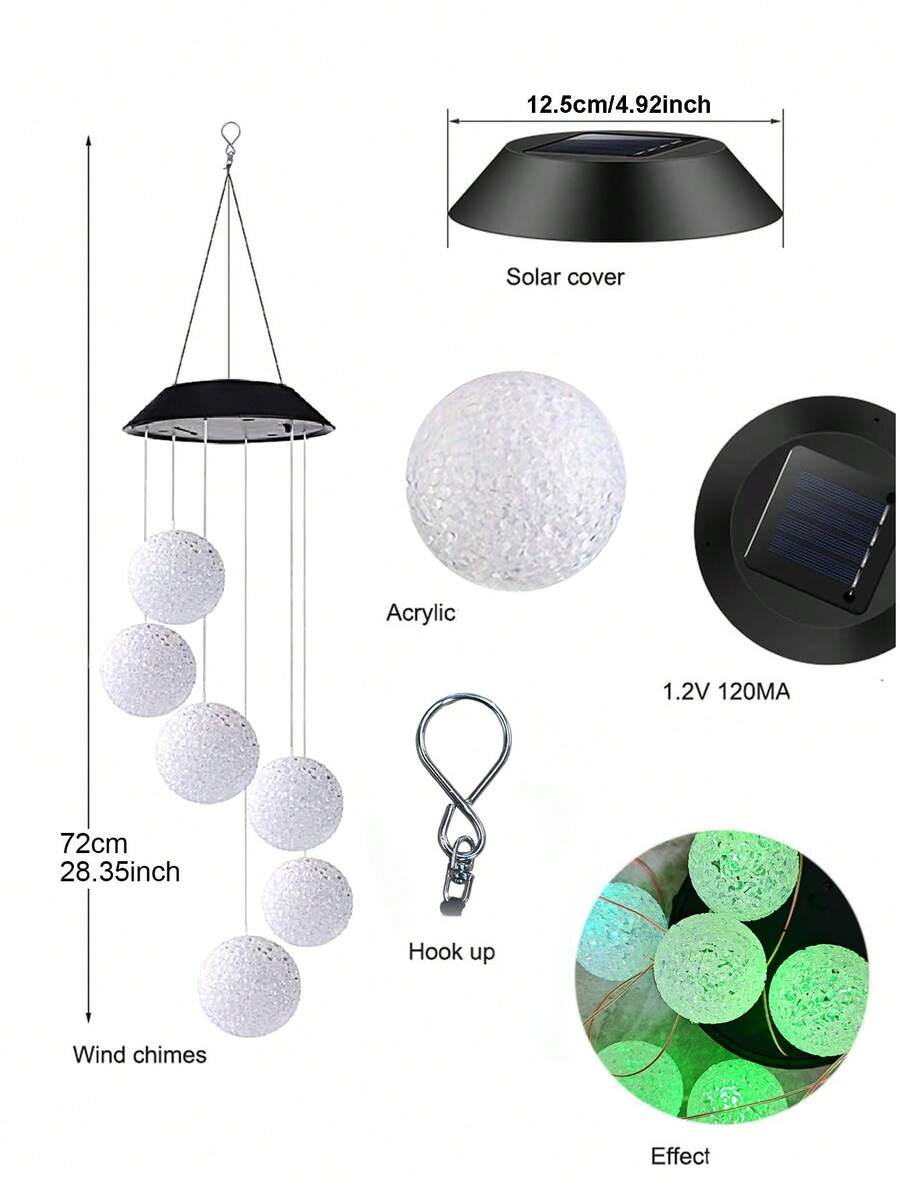 Solar color changing wind chimes with RGB rose ball lights glowing outdoors