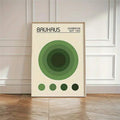 Bauhaus poster with layered green circles and four gradient dots