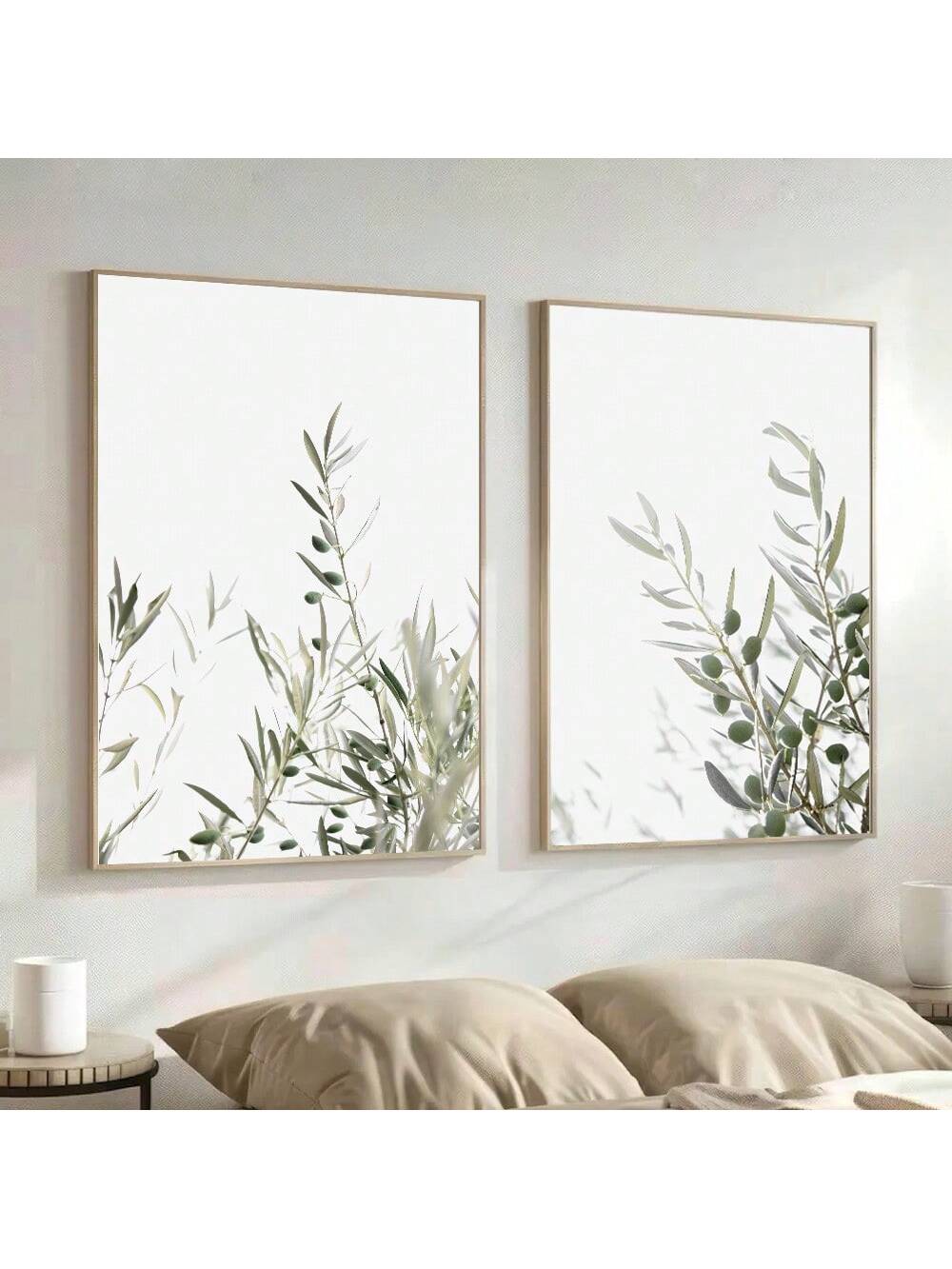 Transform your space with this set of 2 unframed olive branch wall art posters. These sophisticated botanical canvas prints feature delicate olive branch imagery that perfectly complements minimalist coastal home décor. The neutral palette and organic design elements create a serene atmosphere while adding refined visual interest to any room. Ideal for creating a cohesive gallery wall or as standalone statement pieces in entryways, living rooms, or bedrooms.
