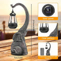 Elephant solar lantern statue size comparison with phone and 21.5 cm height.