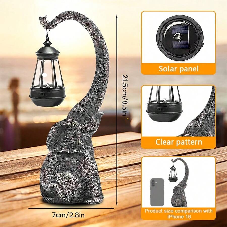 Elephant solar lantern statue size comparison with phone and 21.5 cm height.