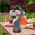 Giraffe solar garden lantern statue variant with 28 cm height and black hanging light.