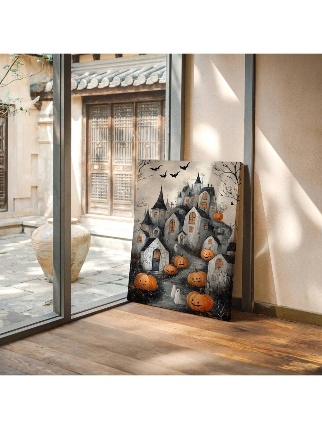 The Spooky Haunted Village Canvas Art brings a refined Halloween atmosphere to your home with its detailed depiction of pumpkins, ghosts, and bats. This festive piece expertly balances spooky charm and artistic quality, making it an ideal addition for seasonal decoration. Its vivid imagery and high-quality canvas construction ensure lasting appeal, enhancing your holiday ambiance with subtle sophistication.