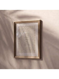 You will never know dear romantic poster displayed in a softly lit interior