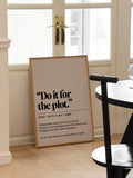 Framed Do it for the plot poster leaning near glass doors and dining chair