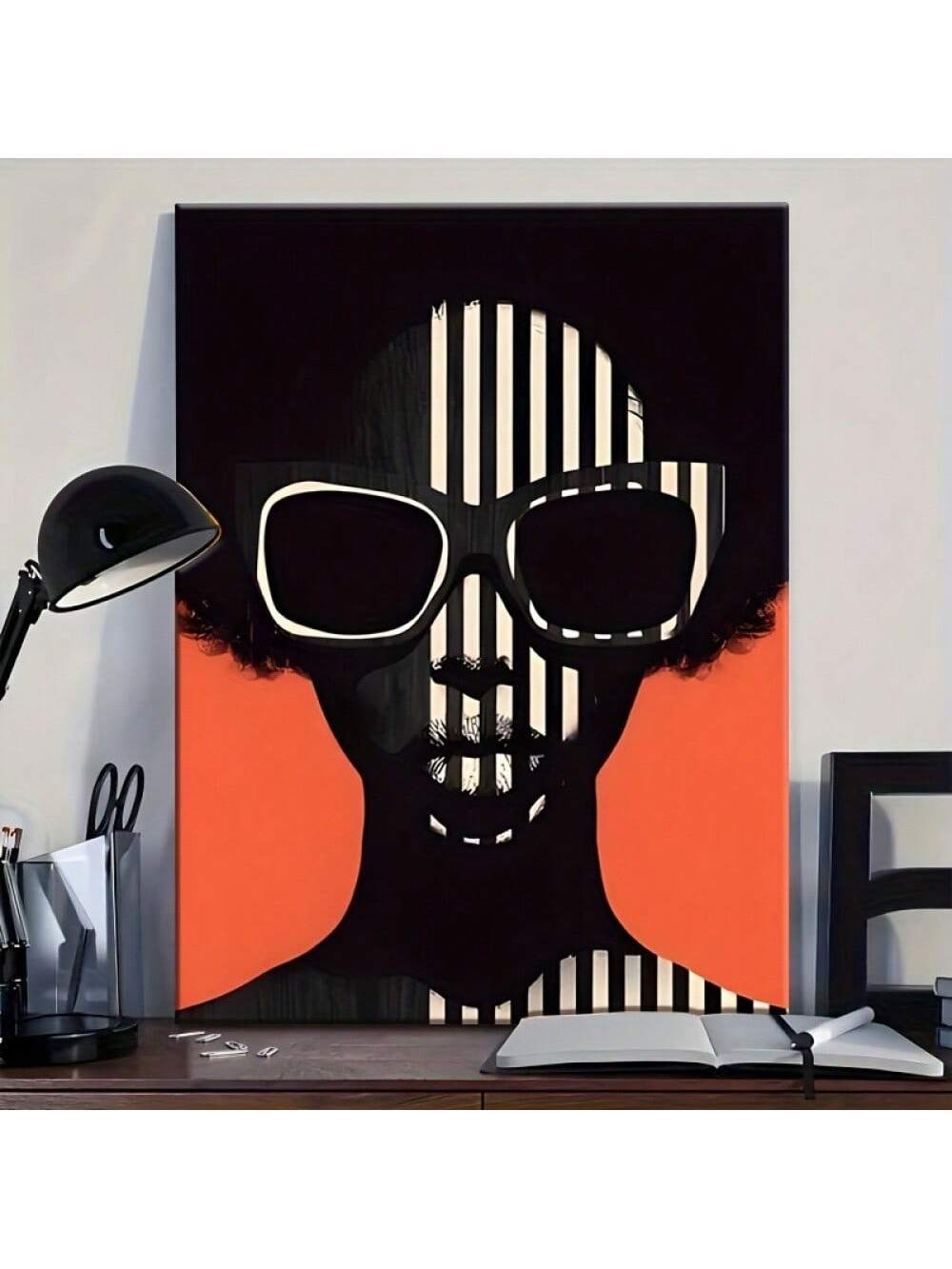 Elevate your space with this elegant abstract canvas art featuring a striking black and white palette accented by vibrant orange hues. Inspired by vintage African minimalist design, this piece brings a sophisticated yet warm atmosphere to both home and office environments. Its balanced composition and bold contrasts make it a timeless addition that complements modern and classic interiors alike. Perfect for those seeking refined artistic expression with cultural depth.