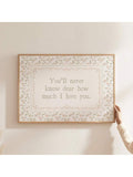 Hand holding horizontal vintage love quote poster for scale reference