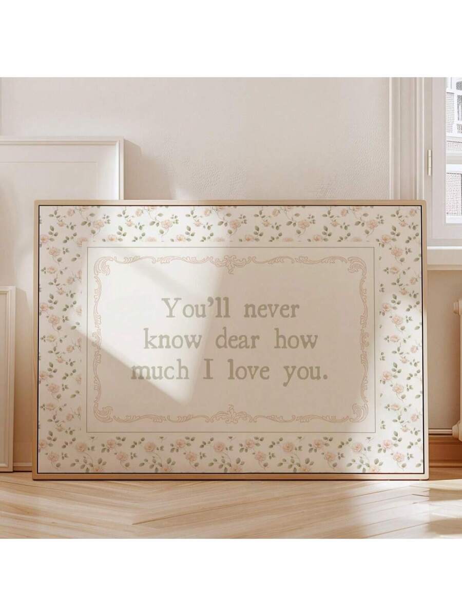 Horizontal pastel floral love quote artwork beside a bright window