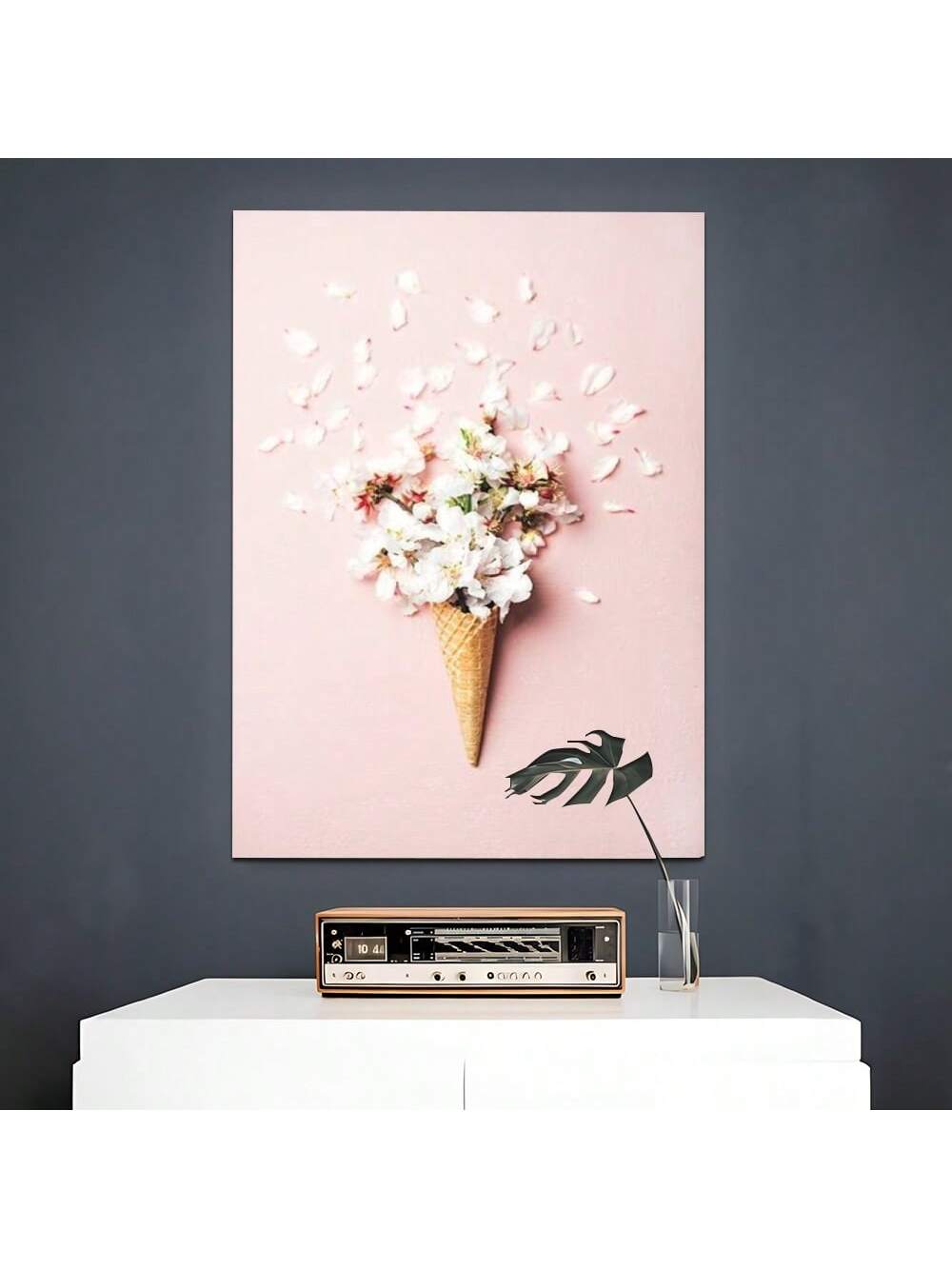 Enhance your living space with this charming Pink Flower Cone framed canvas poster. Its delicate floral design adds a refined touch to any room, creating an inviting and elegant atmosphere. Ideal for home décor enthusiasts, this poster offers a sophisticated accent while serving as a thoughtful gift for special occasions. Crafted with quality framing and vibrant printing, it promises lasting beauty and effortless style.