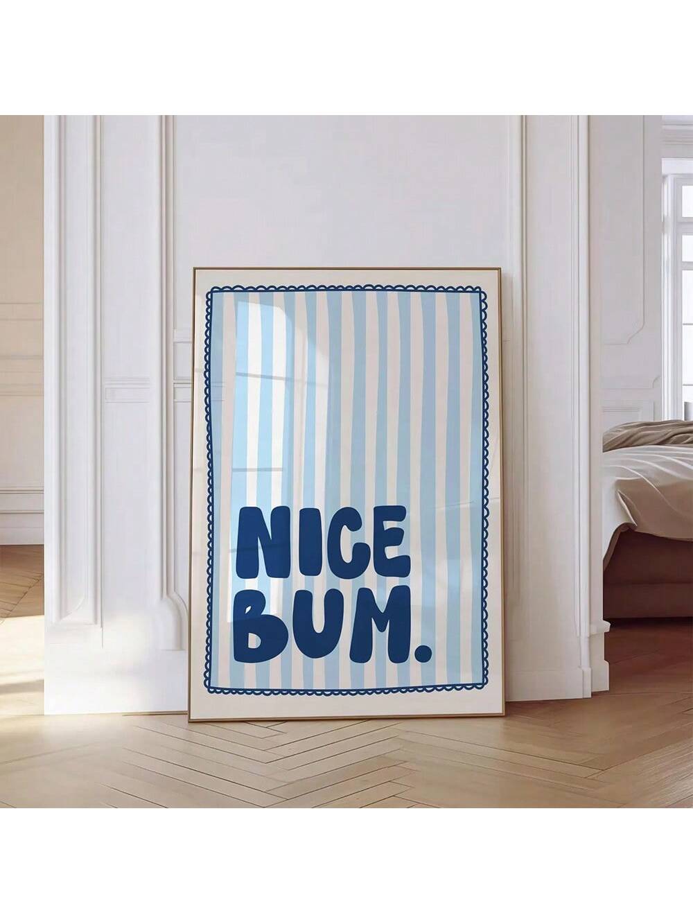 Add a playful touch to your bathroom with this Chic Blue Stripe 'Nice Bum' poster. Featuring minimalist design and clean lines, this canvas wall art blends humor with modern decor seamlessly. Its subtle blue stripes enhance any space while delivering a witty compliment that lightens the mood. Durable and stylish, it’s an expert choice for refreshing your bathroom ambiance with contemporary charm.
