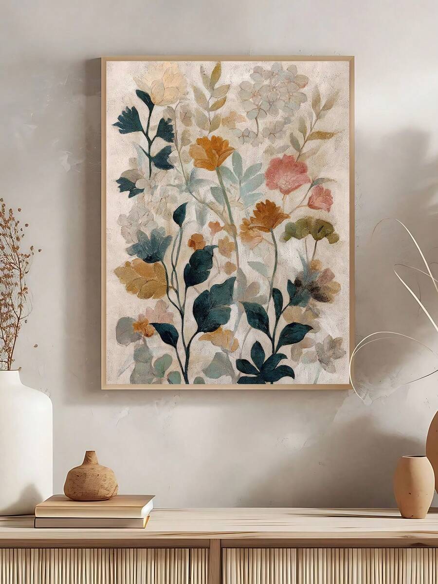 Framed abstract botanical flower wall art above console with neutral decor