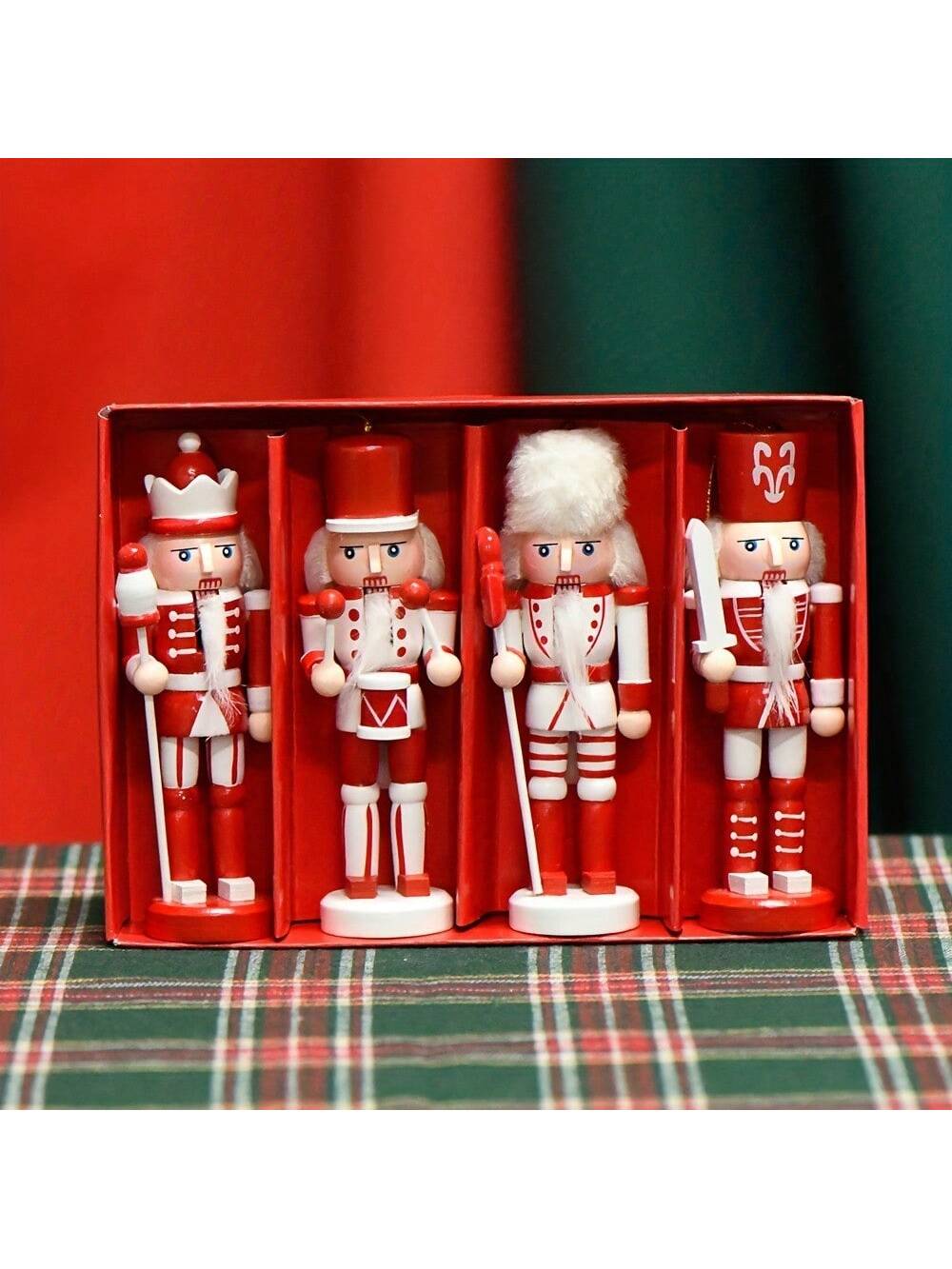 Bring timeless holiday charm to your home with this exquisite 4-piece wooden nutcracker soldier set. Handcrafted with meticulous attention to detail, each soldier features traditional painted uniforms and authentic soldier styling that captures the essence of classic Christmas décor. The durable wooden construction ensures these decorative pieces withstand seasons of festive display. Ideal for mantels, shelves, and tabletops throughout your living room and bedroom, this set adds sophisticated holiday charac