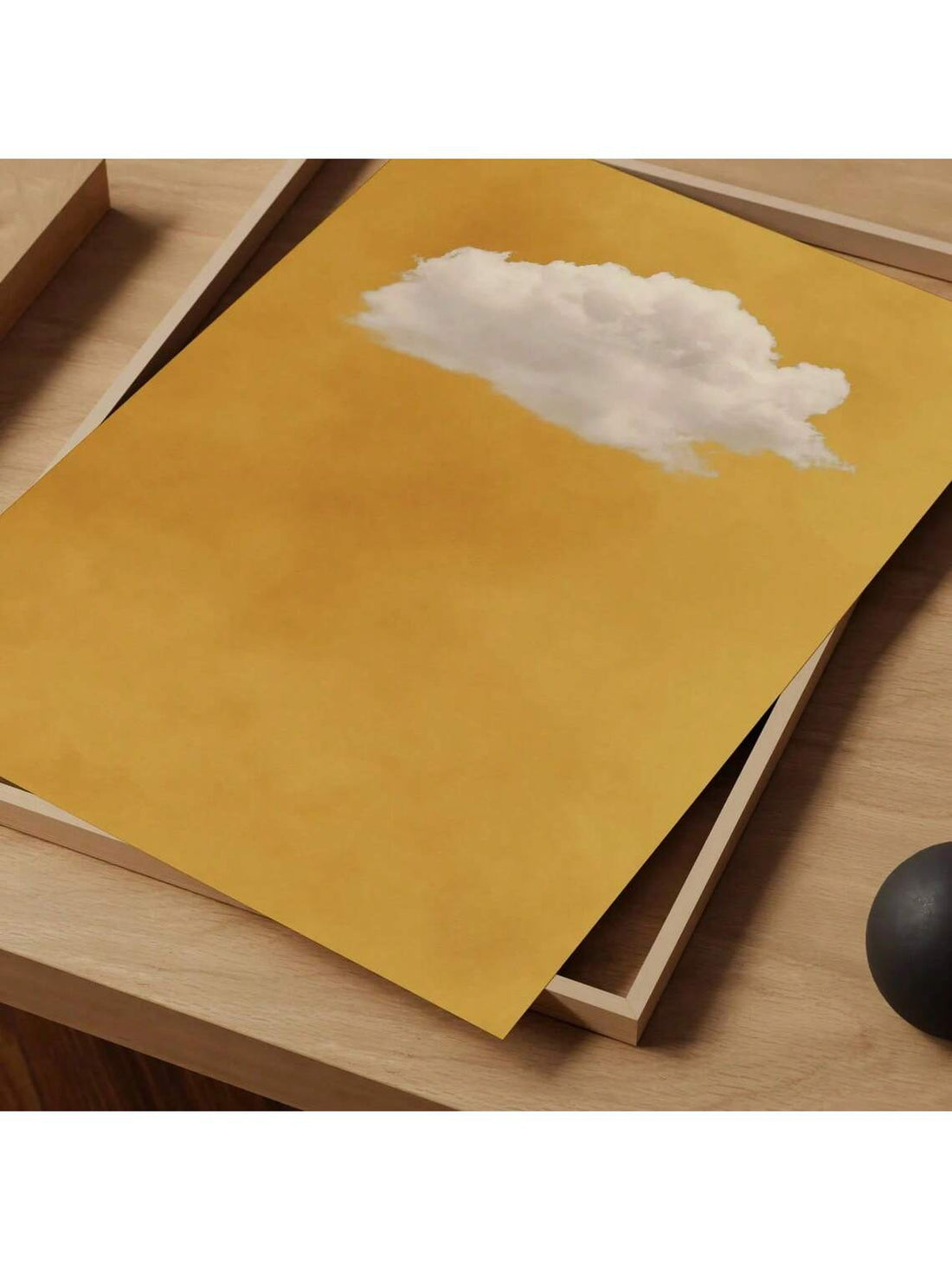 This striking abstract canvas print captures the essence of minimalist design with its soft, vintage-inspired cloud motifs rendered in warm sunny yellow tones.