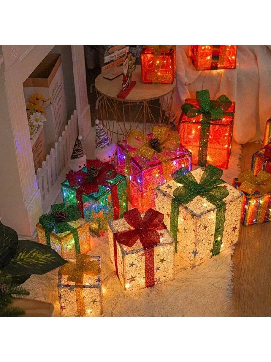 Transform your holiday spaces with this enchanting LED Christmas Gift Box Set, featuring three decorative pieces designed to elevate both indoor and outdoor festive displays. Each box combines elegant styling with warm LED illumination, creating an inviting ambiance that captures the magic of the season. Perfect for entryways, mantels, patios, or garden settings, these versatile decorative boxes work seamlessly with any holiday aesthetic. The durable construction ensures reliable performance throughout the 