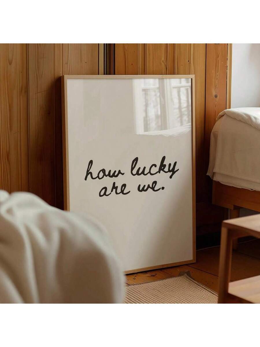 Celebrate life's blessings with this charming vintage-inspired wall art featuring the uplifting message "We Are So Lucky." This versatile canvas print combines heartfelt sentiment with timeless design, making it perfect for bedrooms, living rooms, or dining spaces. Available in multicolor tones with clean lettering, it brings warmth and positivity to any room. The waterproof fabric material ensures durability, while the simple aesthetic complements both modern and traditional décor. Choose between framed or