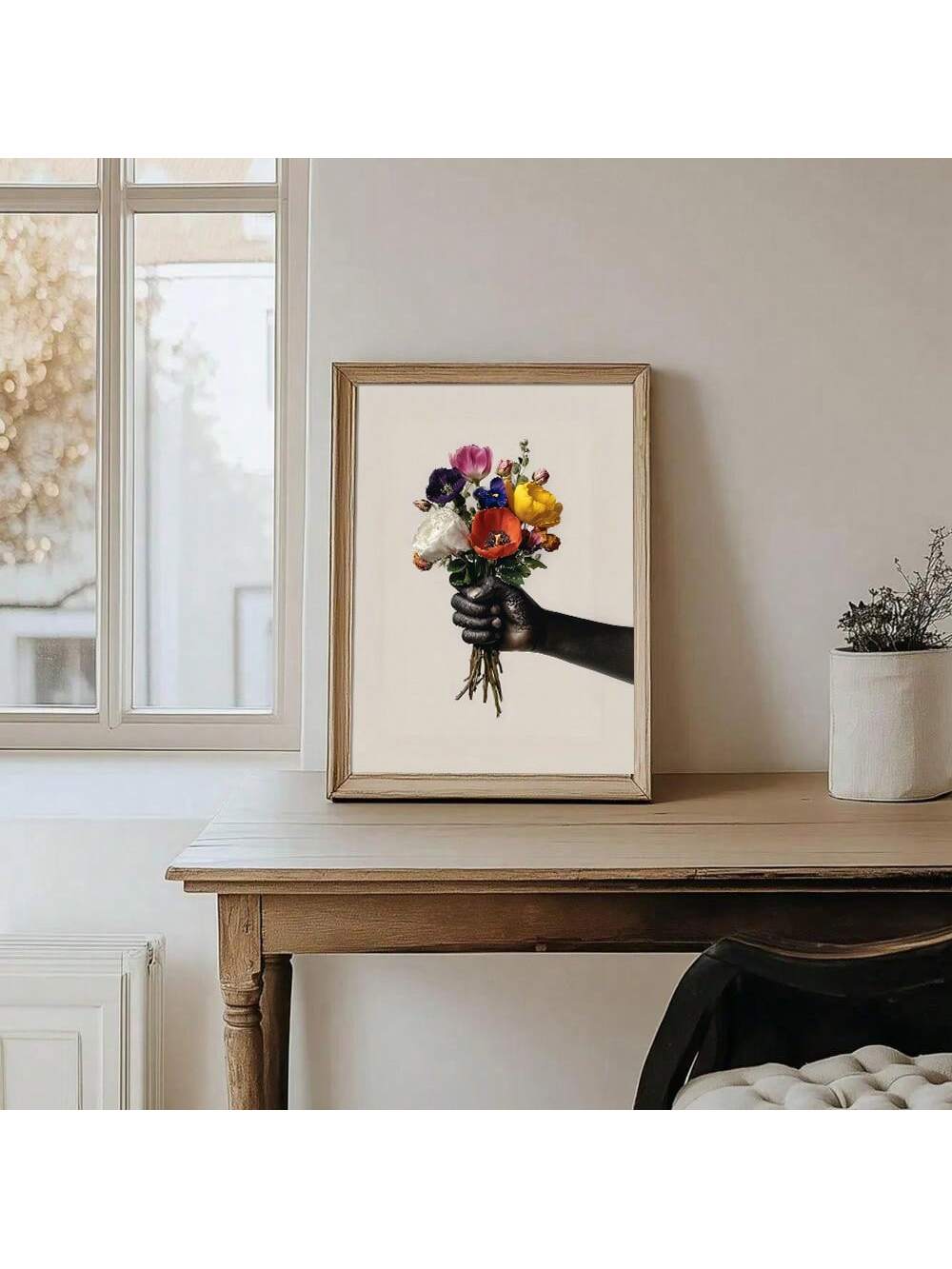 Elevate your interior with this striking Afrocentric floral wall art print, where contemporary minimalism meets cultural richness. Featuring bold botanical motifs inspired by African aesthetics, this canvas piece brings warmth and sophistication to any modern space. The carefully curated color palette and clean lines complement both eclectic boho and streamlined contemporary décor. Perfect for living rooms, bedrooms, or creative workspaces, this print celebrates natural beauty while adding visual interest w