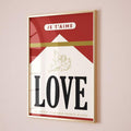 Red romantic typography artwork displayed on a neutral living room wall