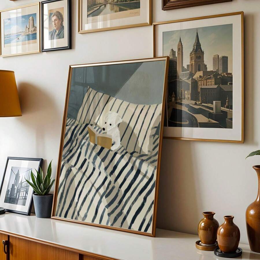 Reading teddy bear wall art styled above a neutral sofa