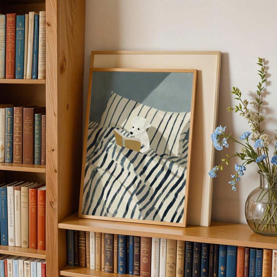 Teddy bear reading print propped in a warm bookshelf nook