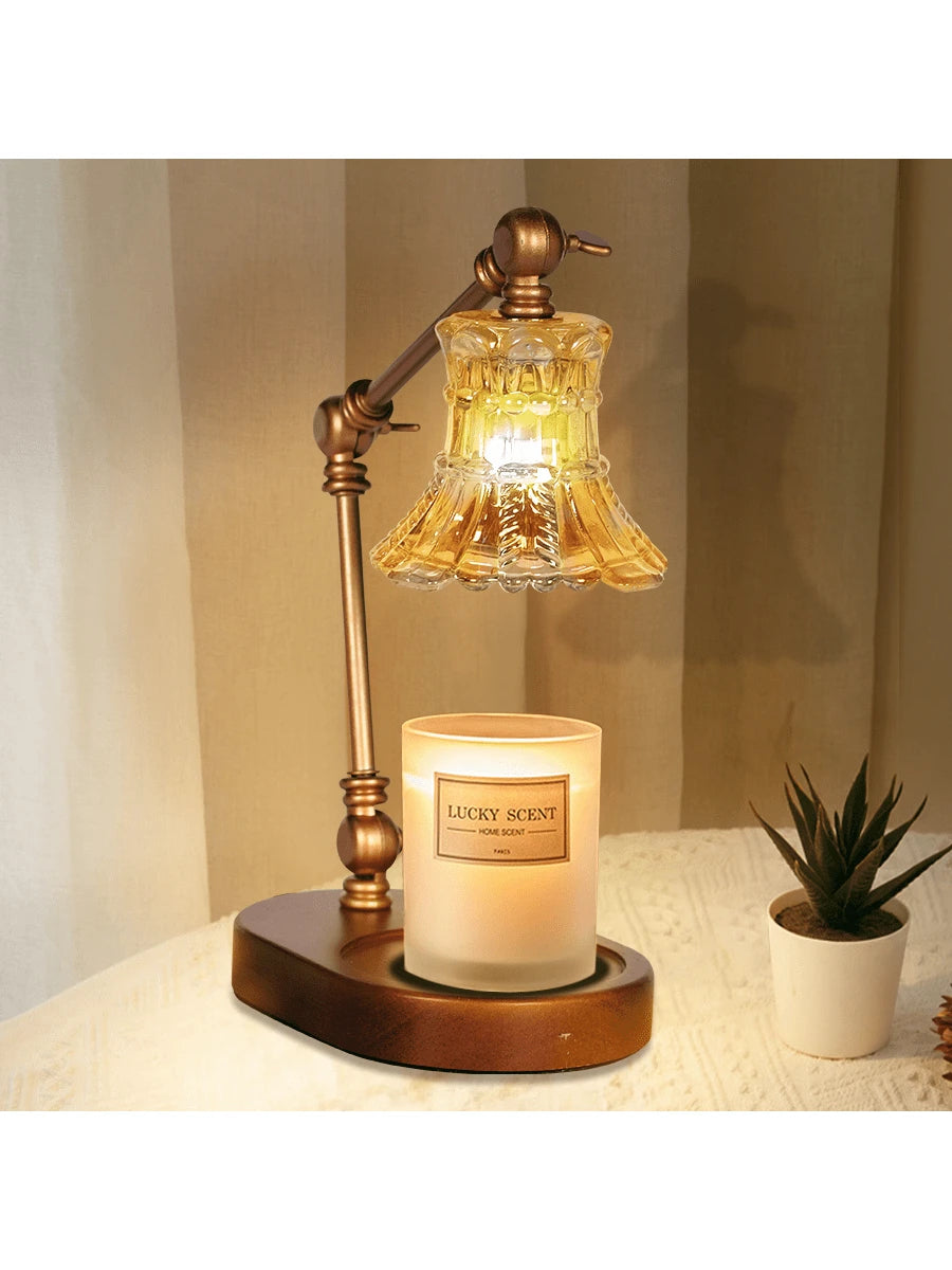 Candle warmer lamp on bedside table shown as safer flameless alternative to burning candle