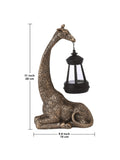 Close view of solar lantern top on animal garden statue with warm LED glow.