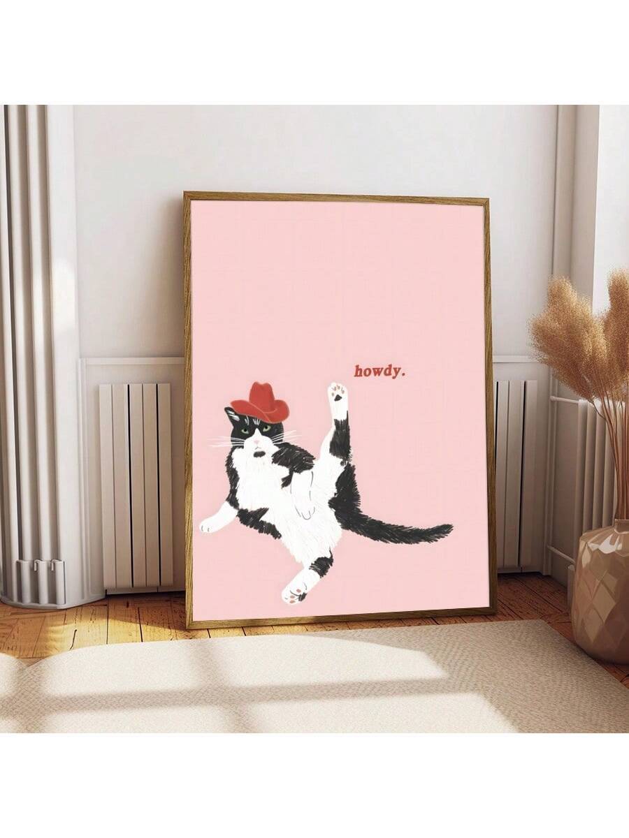 Humorous cat print displayed in gold frame room styling