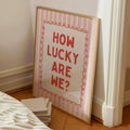 Preppy wall decor shown in gold frame with cute collegiate quote style