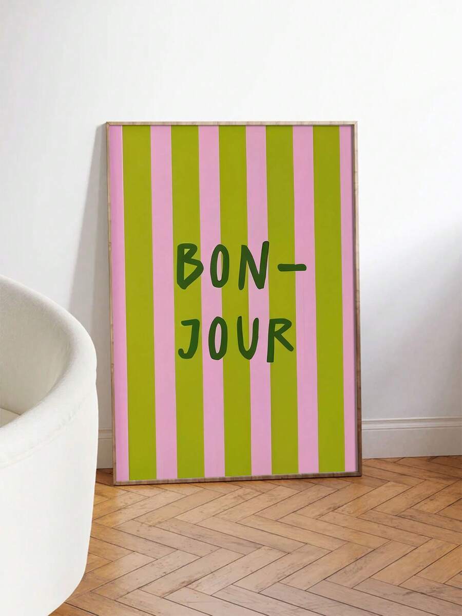 Add a touch of French elegance to your space with this modern "Bonjour" art print. Featuring striking pink and green stripes paired with contemporary typography, it's the perfect accent piece for bedrooms, living rooms, home offices, and beyond. The unframed design offers versatility—display it in a frame of your choice or use it as-is for a minimalist aesthetic. Ideal for those who appreciate chic, understated decor that brings personality and warmth to any room. A timeless addition to your home that celeb