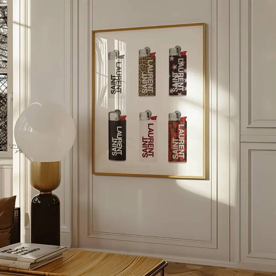 Vintage lighter collection wall art with Saint Laurent lighter graphics in gold frame