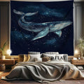 Oversized whale tapestry shown above bed as bedroom wall decor