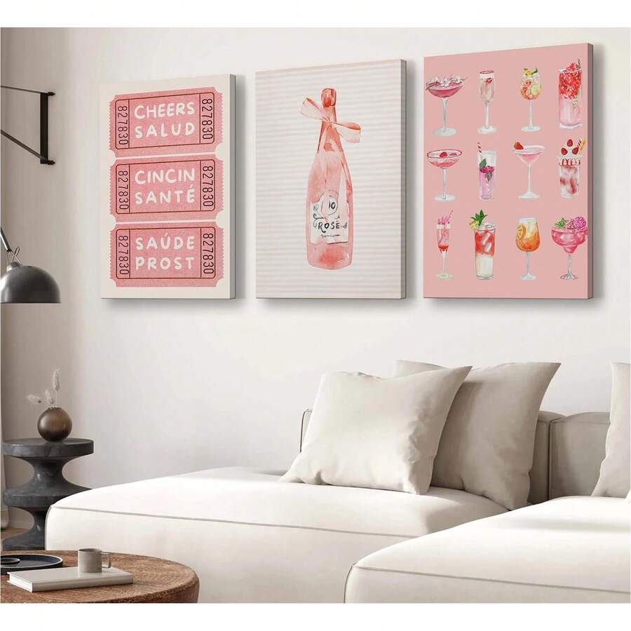 Pink cocktail canvas prints styled above a bright living room sofa