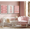 Pink cocktail and rosé wall art above a dining room sideboard