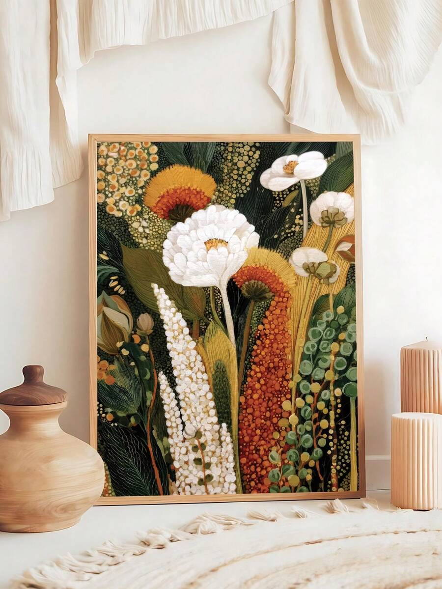 Framed boho floral print styled with candles wood vase and neutral textiles