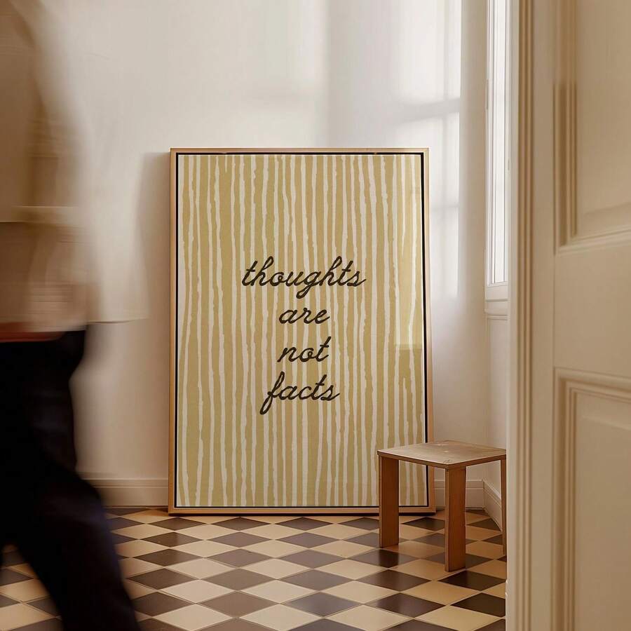 Bring mindfulness and positivity into your space with this modern frameless canvas art. Featuring the empowering message "Thoughts Are Not Facts," this piece serves as a daily reminder for mental wellness and self-compassion. Perfect for therapy offices, bedrooms, living rooms, or any space needing inspiration. Crafted on durable, waterproof canvas, this unframed painting blends seamlessly with contemporary décor. The clean typography and minimalist design complement any interior style while sparking meanin