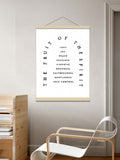 Christian scripture poster displayed with natural wood hanger