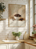 Framed coffee bean bowl wall art on white brick kitchen wall