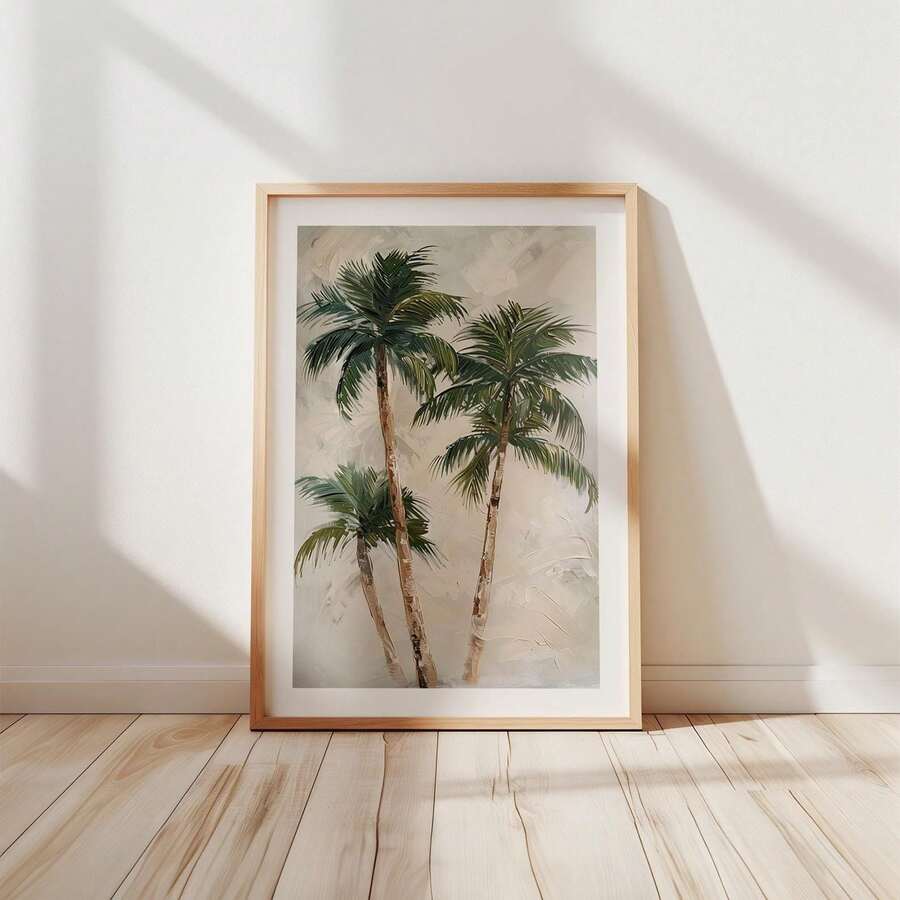 Palm tree wall print with white mat in light wood frame on floor