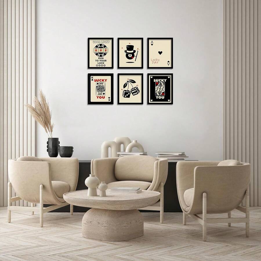 Six black framed casino art prints arranged above modern lounge seating