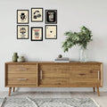 Lucky card themed wall art set displayed above a wooden sideboard