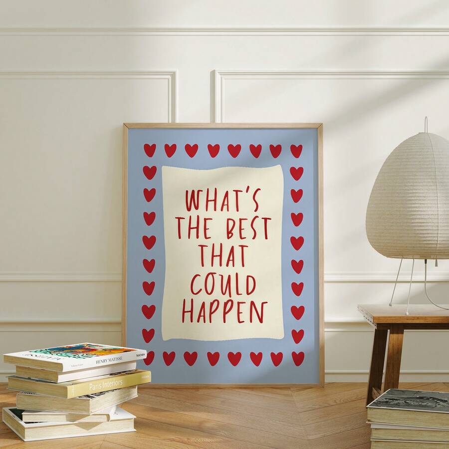 Positive quote heart artwork styled with books and a paper lantern