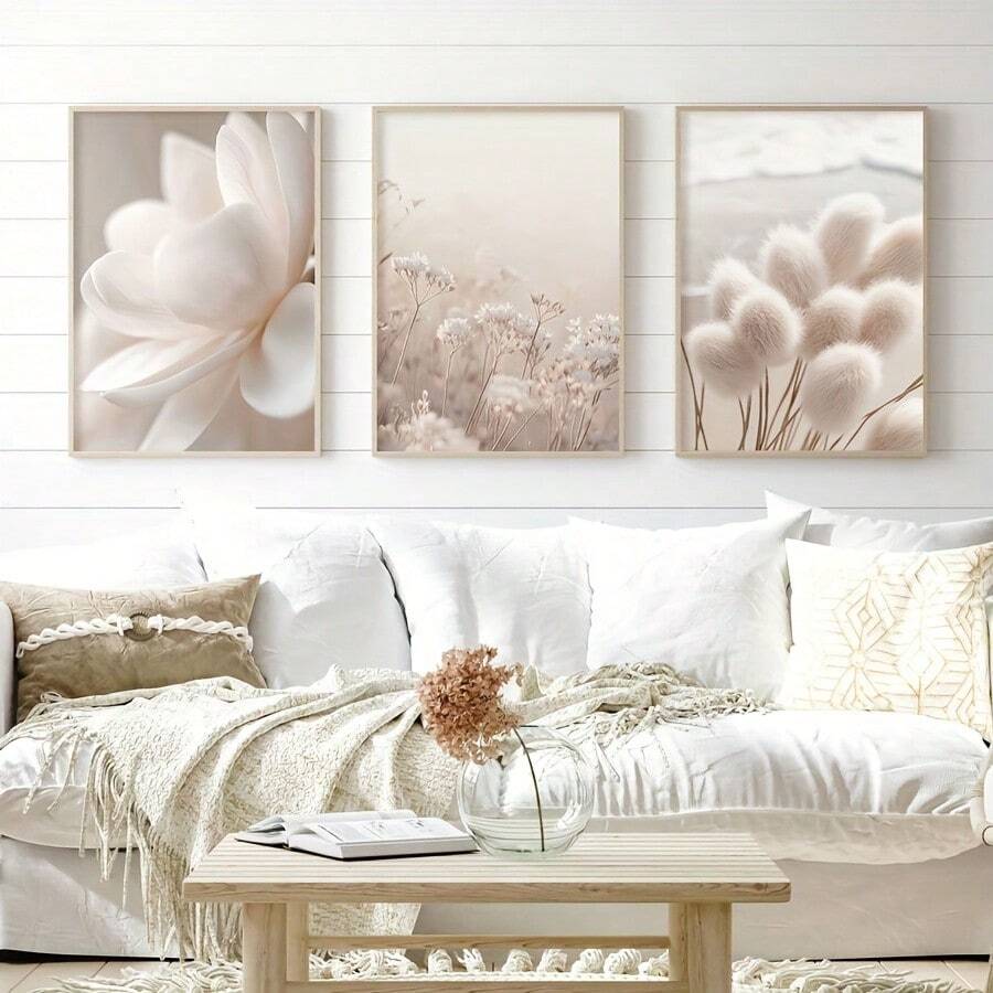 Minimalist floral canvas set styled above a white sofa