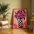 Pink and black pop-surreal canvas poster with floral vase in a living room