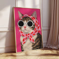 Framed cat wall art displayed beside a window