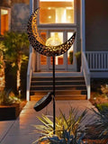Solar moon and sun garden path light showing higher conversion solar panel.