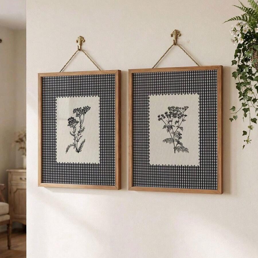 Pair of black botanical gingham canvas posters in slim black frames