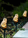 Owl garden stake light with side solar panel and stump detail