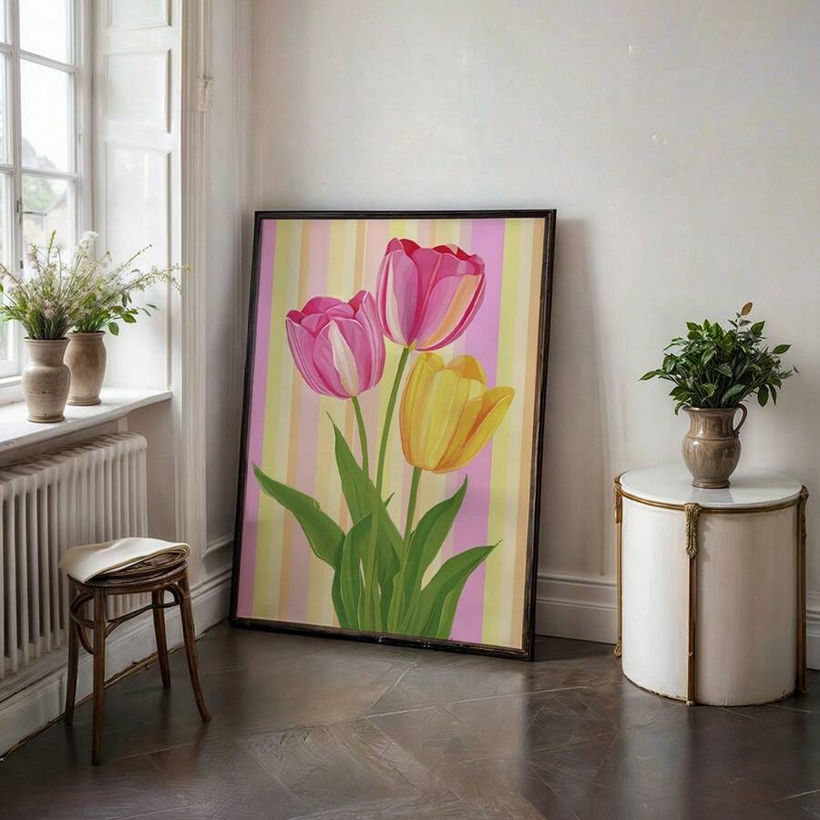 Pastel tulip canvas artwork in a black frame near a bright window