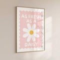 Pink daisy typography poster mounted on neutral wall
