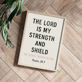 Styled view of unframed Christian canvas art for home and office display